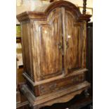 A contemporary rustic stained hardwood double door low side cabinet, with single long lower