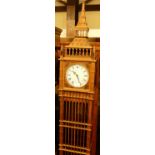 A highly unusual reproduction hardwood architectural longcase clock, the white enamel convex dial