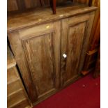 A pitched pine double door side cupboard, with twin fixed interior shelves, w.95cm
