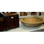 An unusual small rustic mahogany table top chest, having four drawers and hinged side compartment,