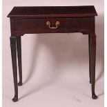 A George III mahogany single drawer side table, raised on pad feet, w.69cm, d.40.5cm, h.