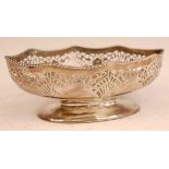 A Walker & Hall silver footed bowl, of shaped oval form with pierced rim, 9.8oz, Sheffield 1912, w.