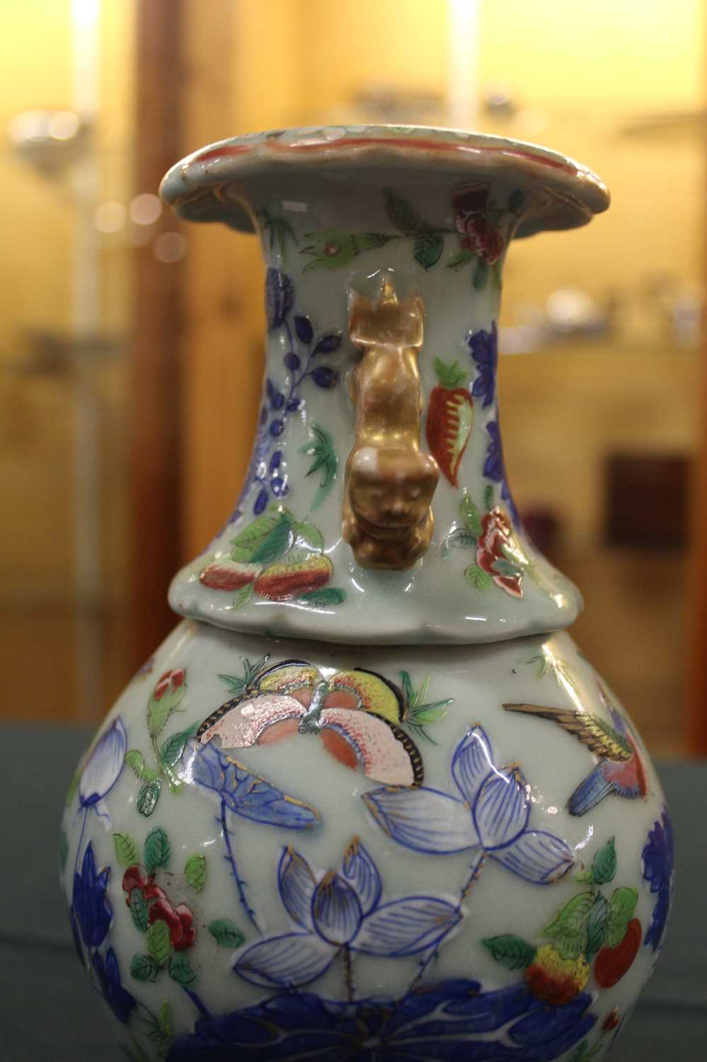 A pair of 19th century Chinese stoneware celadon ground vases, each enamel decorated with exotic - Image 17 of 24