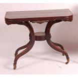 A Regency rosewood pedestal tea table, the fold-over and satinwood crossbanded top on unusual