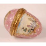 A late 18th century English enamel egg shaped bonbonniere, the pink ground decorated with three
