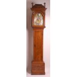 John Berry of London - an 18th century walnut longcase clock, having a 12" brass arched dial, signed