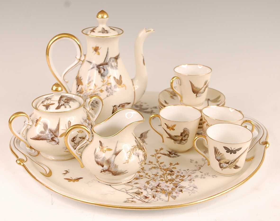 A circa 1900 continental porcelain part coffee service on cabaret tray, comprising coffee pot,