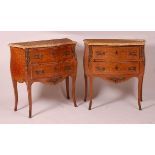 A pair of kingwood and parquetry marble topped bombe commodes, in the Louis XV style, second half