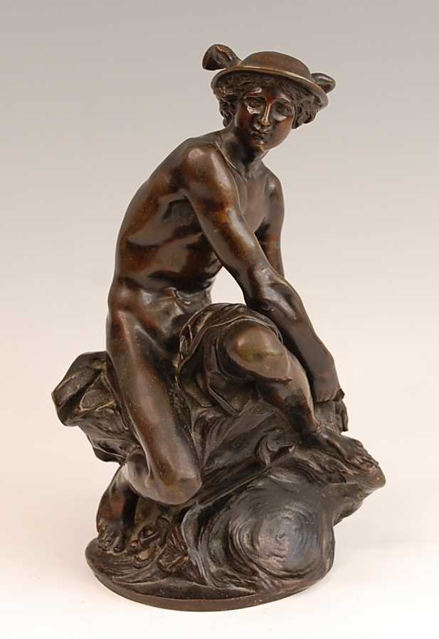 A late 19th century French bronze figure of Mercury, signed to edge of base Delafontaine, dark-brown