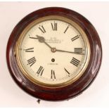 An oak cased circular dial wall clock, the white enamel dial signed 'S.I.R. J. No Walker Ltd, 63 New