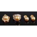 A suite of jewellery, comprising a pair of yellow metal pearl and diamond drop earrings, each