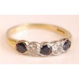 An 18ct yellow and white gold, sapphire and diamond five-stone half hoop eternity ring, featuring