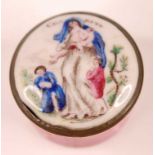 A late 18th century English enamel circular patch box, having screw-off metal mounted lid, the lid