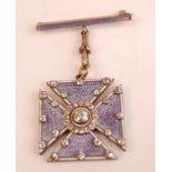 A yellow and white metal, diamond and enamel pendant brooch in the form of a Maltese cross,