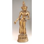 A probably Tibetan bronze figure of the Buddhist Goddess Tara, in standing pose depicting the '