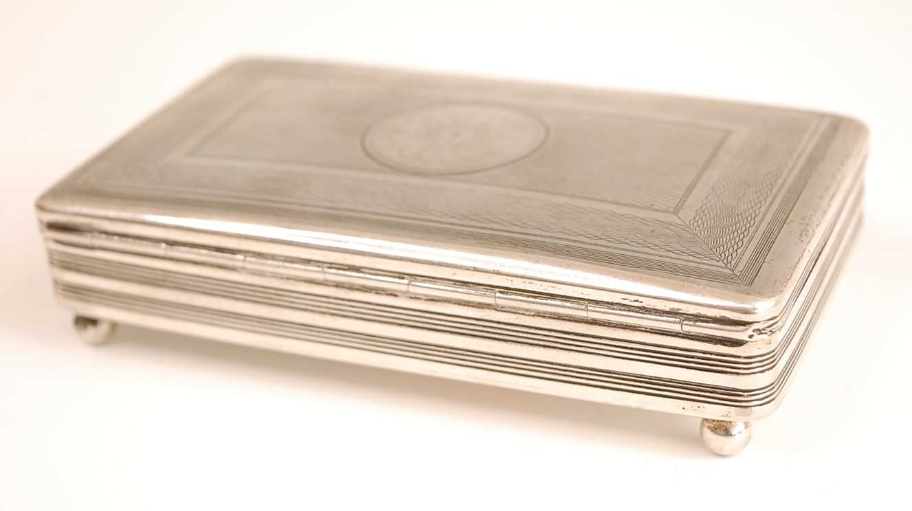 A 19th century Dutch silver tobacco box, having engine turned hinged cover and reeded banded - Image 2 of 5