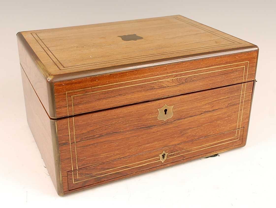 A Victorian rosewood and brass bound fitted toilet box, the hinge cover opening to reveal velvet - Image 2 of 5