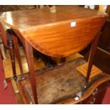 A George III mahogany Pembroke table, having a rosewood crossbanded top above a single end frieze