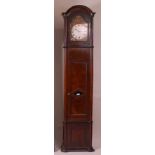 A mid-19th century continental walnut longcase clock, having unsigned convex white enamel Roman dial