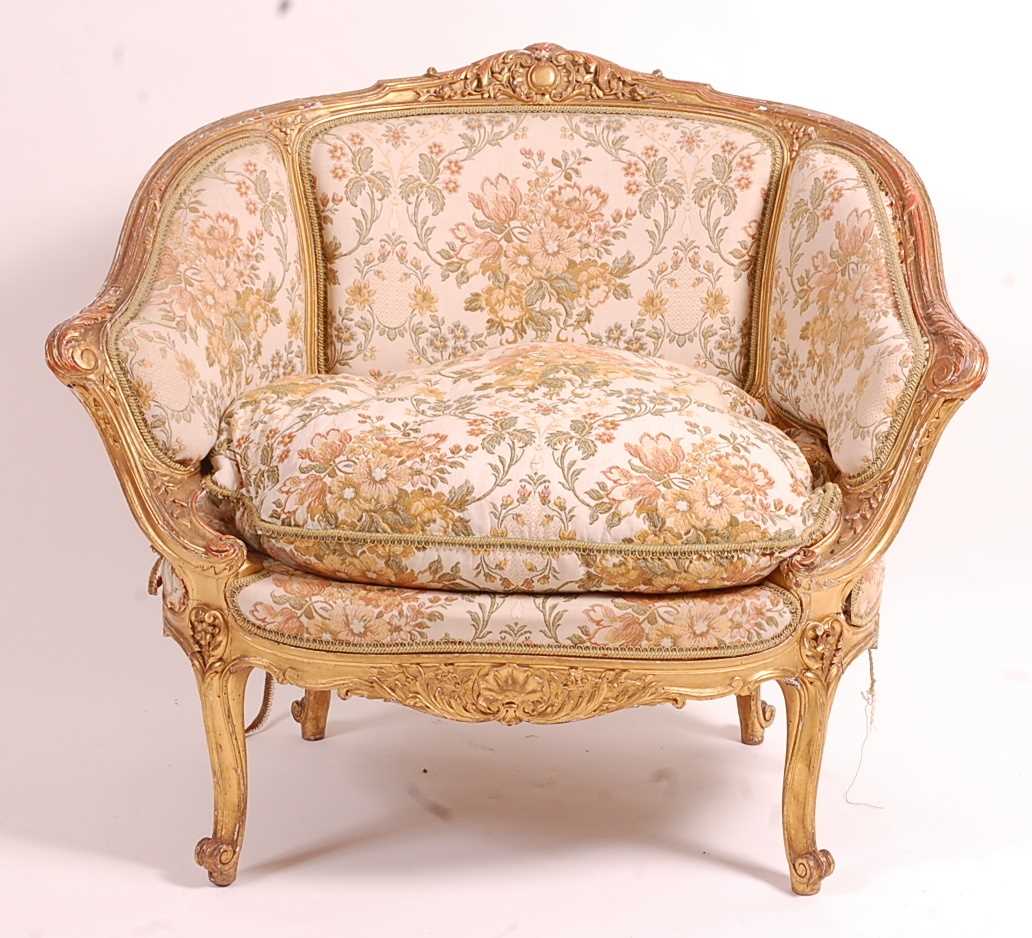 A 19th century giltwood and gesso tub chair, the swept frame with acanthus leaf moulding, silk