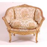 A 19th century giltwood and gesso tub chair, the swept frame with acanthus leaf moulding, silk