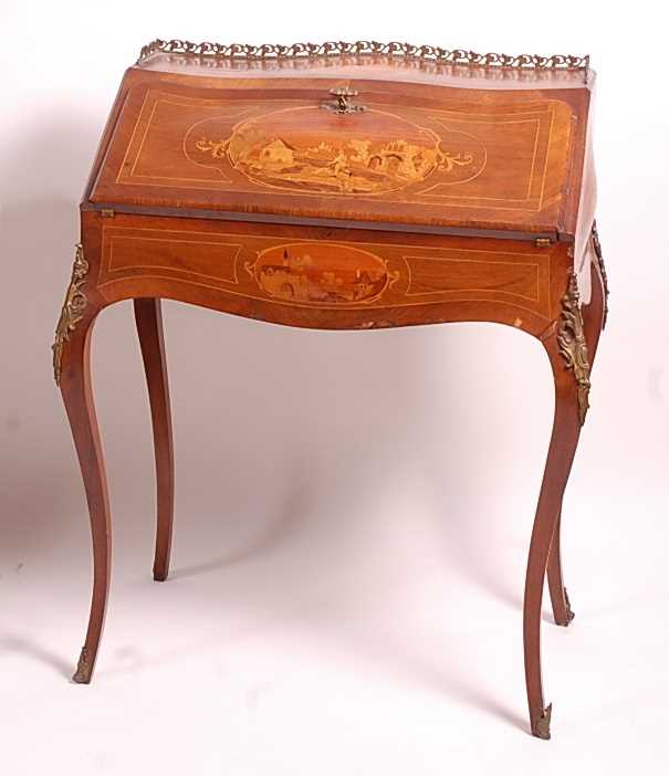 A circa 1900 continental rosewood Bureau de Dame, of slender bombe form, the fall being marquetry