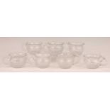 A set of seven William IV cut glass custard cups, each with fluted tapering bodies, dia. 7cm