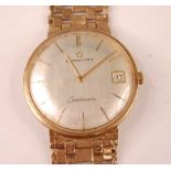 A gent's Eterna-matic Centenraire 9ct gold case wristwatch, having signed silvered dial with baton