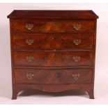 An Edwardian walnut and rosewood crossbanded chest, of serpentine outline, having four long