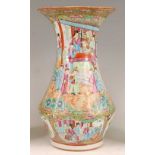 A 19th century Chinese Canton famille rose vase, enamel decorated with ceremonial figure scenes