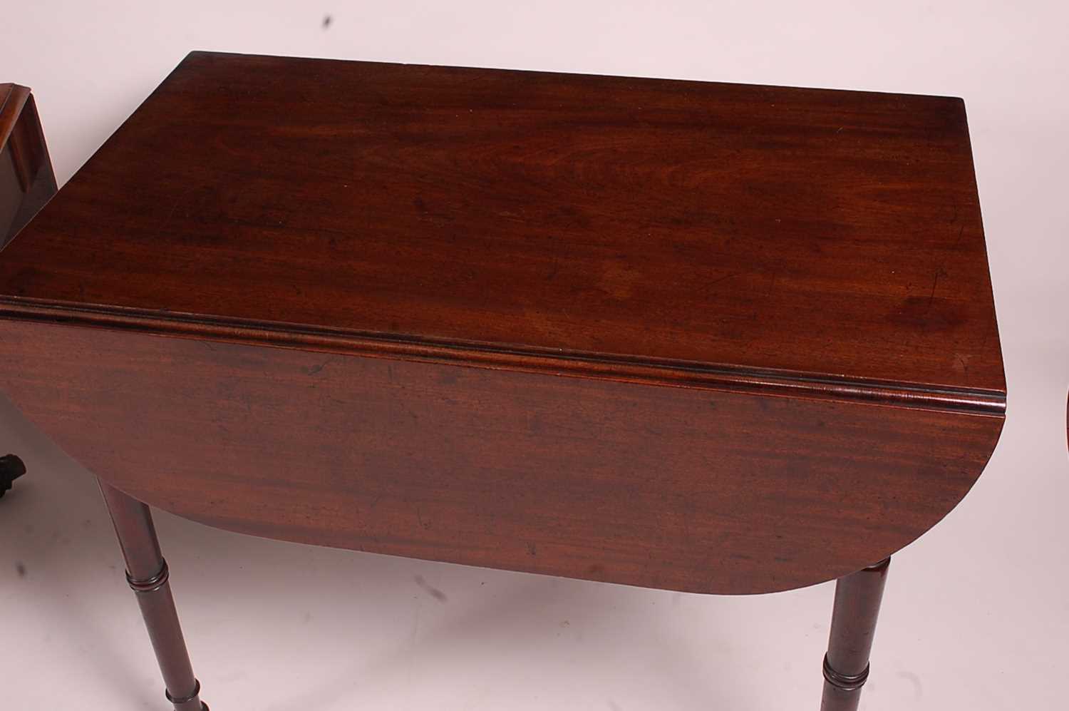 A late Georgian mahogany Pembroke table, having single end frieze drawer and raised on ring turned - Image 2 of 2