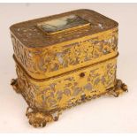 A 19th century continental glass and cut brass overlaid casket, the hinged cover inset with oil on