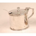 An Edwardian silver mustard pot with blue glass liner, silver weight 5.2oz, maker George Perkins,