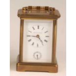 Matthew Norman of London, a lacquered brass cased carriage clock, having signed white enamel Roman