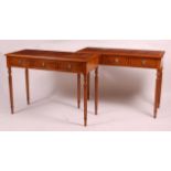 A pair of elm and crossbanded three drawer hall tables, in the 18th century style, each raised on