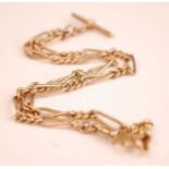 A 9ct gold fetter link watch chain, with T bar and additional 15ct gold clasp to one end, 21.6g,