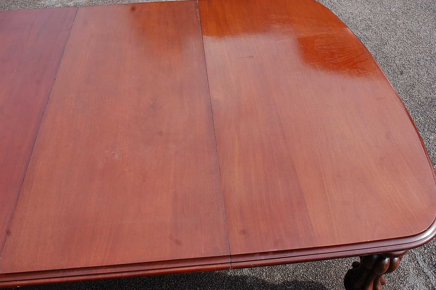 A Victorian mahogany extending dining table, of good size, the top having double wind-out action, - Image 4 of 7