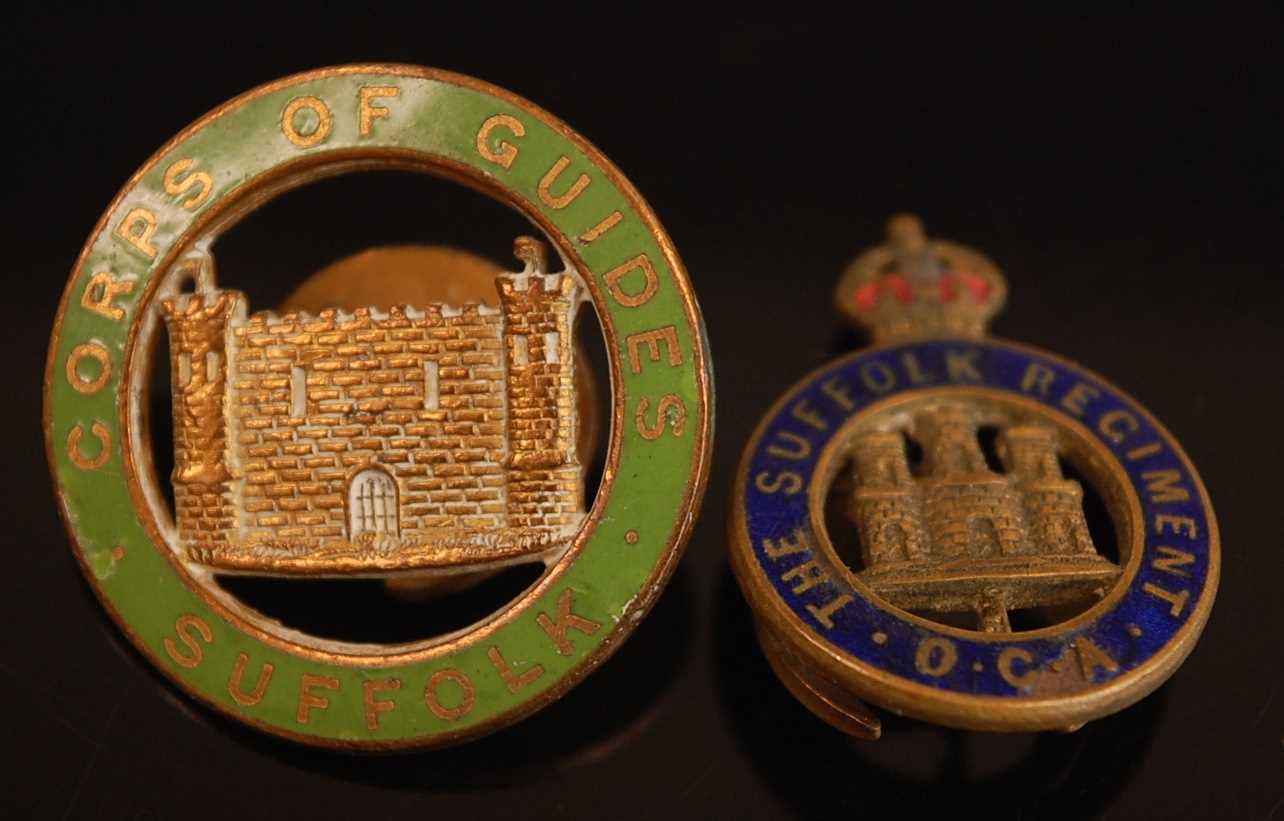 A Suffolk Corps of Guides green enamelled lapel badge, numbered verso 459, together with a Suffolk