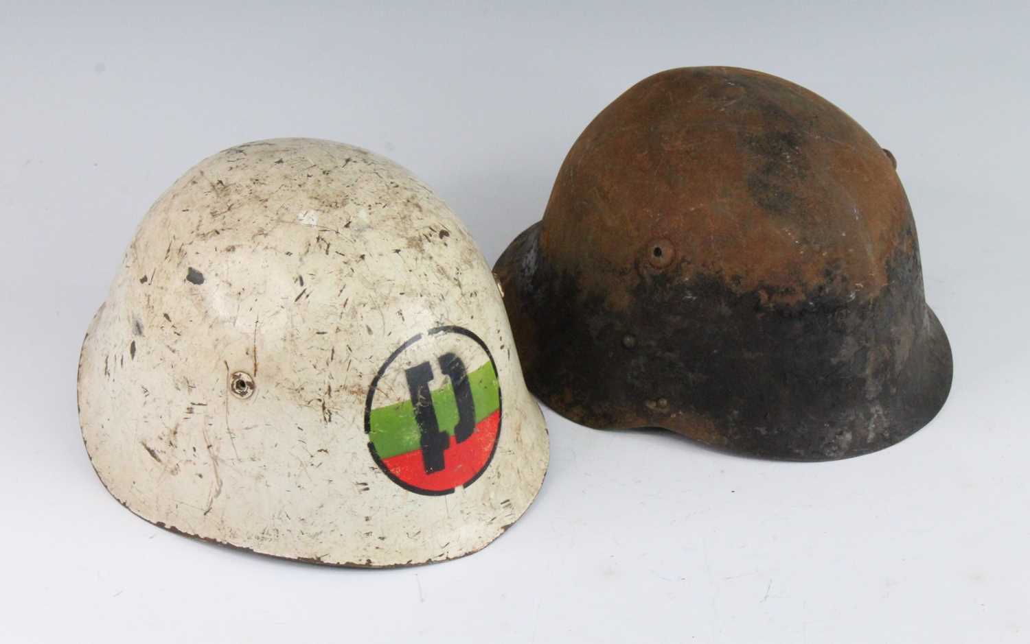 A collection of miscellaneous items to include a Bulgarian Military Police helmet, one other helmet,