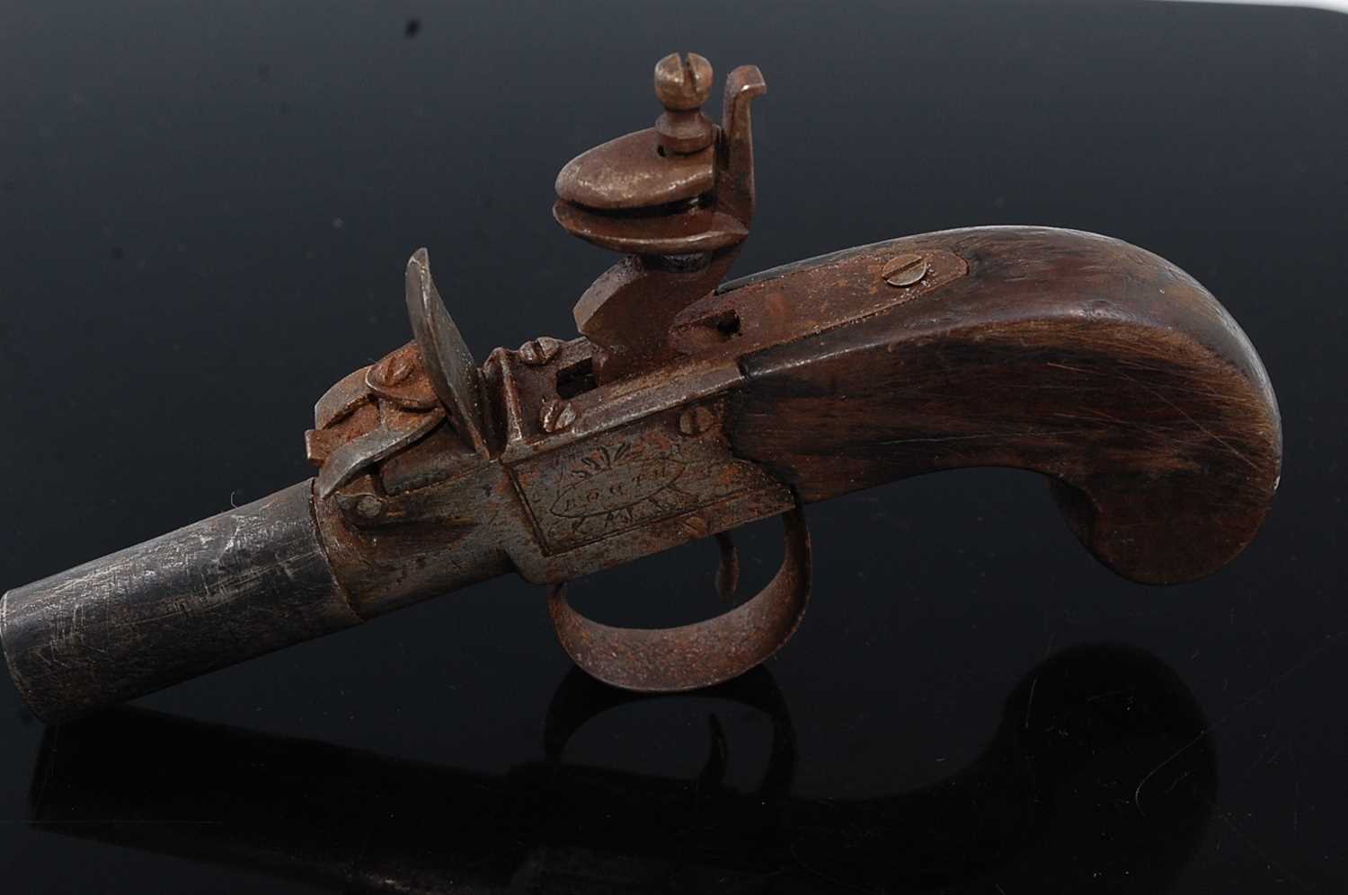 A 19th century flintlock box-lock pocket pistol, having a 4cm turn-off steel barrel, the lock signed - Image 2 of 4