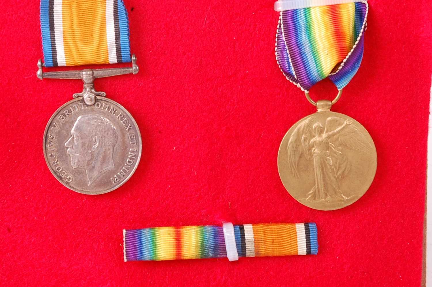 A WW I British War and Victory pair, naming 202738 PTE. J. HOPKINSON. E. LANC. R. (2)