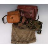 A collection of shooting related items to include a canvas game carrier with leather trim and