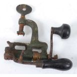 A 19th century cast iron and brass mounted cartridge loader, by James Dixon & Sons, 15cm.