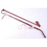 A mid-20th century riding crop, having a bamboo shaft and stag antler handle, the silver plated