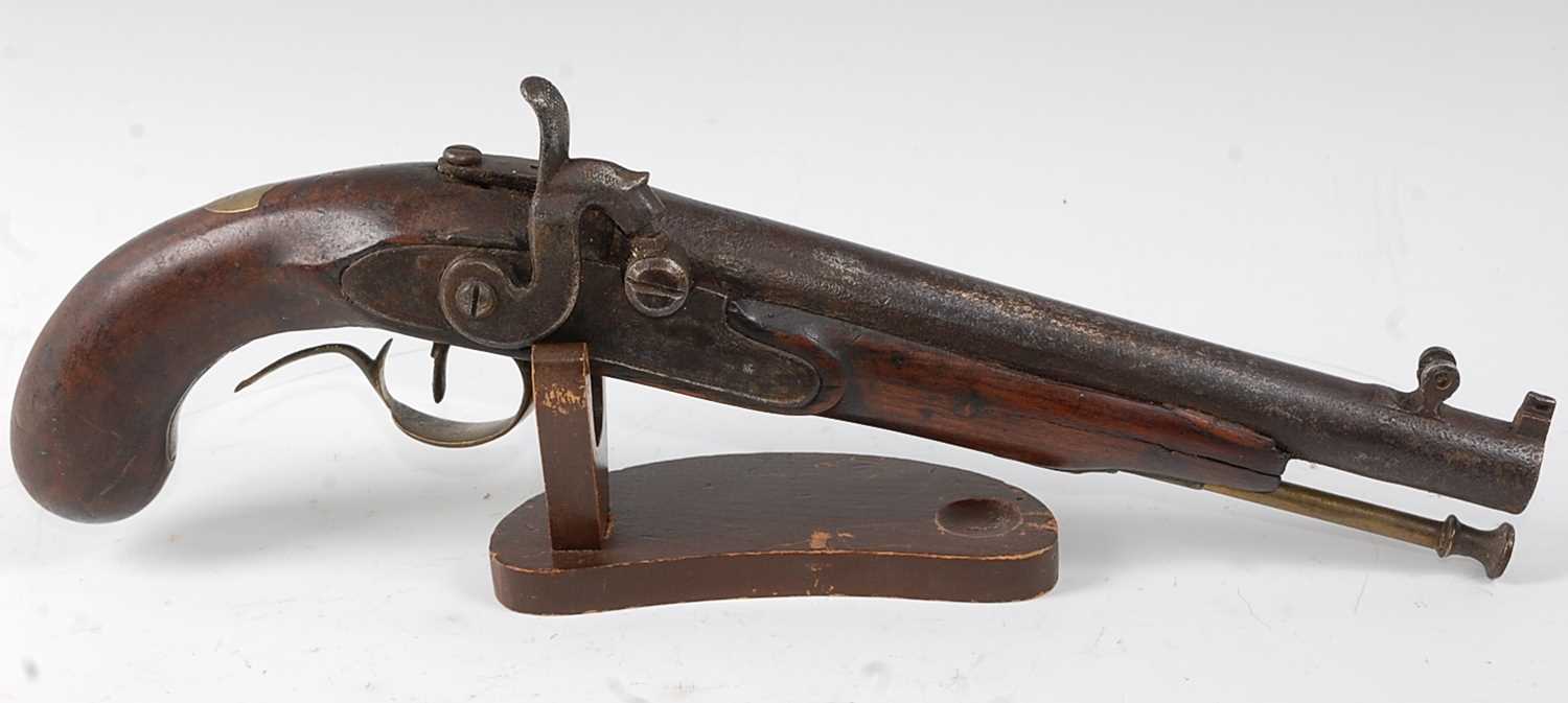 A 19th century English percussion pistol, having a 23cm sighted barrel marked London, with