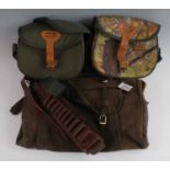 A Jack Pyke green canvas and brown leather cartridge bag, together with one other Jack Pyke