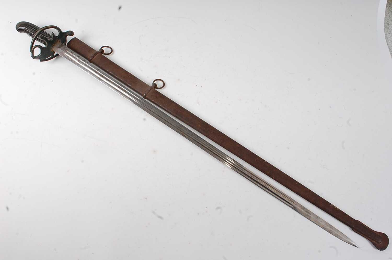 A 19th century sword, having an 81cm straight double fullered blade with the remains of a three - Image 2 of 7