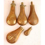 A 19th century brass powder flask, of plain pear shape, the brass nozzle measuring 2 1/4 - 3 drams