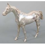 A contemporary Continental silver model of a horse, maker J.M.R., London import mark for 1968, h.