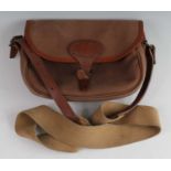 A Quality Gunslips canvas cartridge bag with stitched brown leather trim.